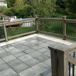 dektek tile luxury cobblestone gray concrete 