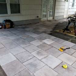 Permeable paver concrete deck tiles patio walk out basement patio installation - flood zone