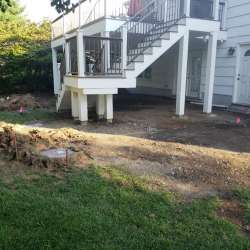 Permeable paver concrete deck tiles patio walk out basement patio installation - flood zone