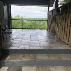 dektek tile luxury cobblestone gray concrete 