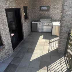 dektek tile luxury cobblestone gray concrete 